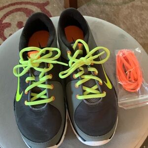Nike tennis shoes dark/light gray with lime green/orange accents w/shoe strings